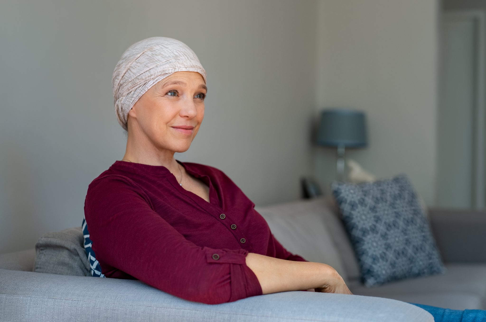 Woman with cancer wearing a headcovering